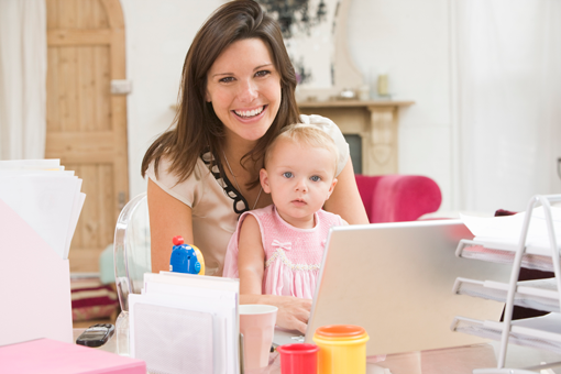 Woman smiling with baby