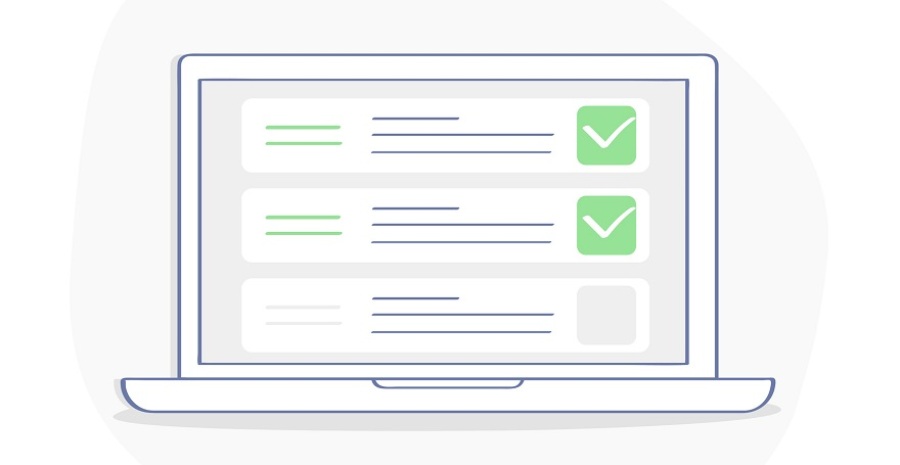 Checklist on laptop display. Three checkboxes with green check marks in two of the boxes.