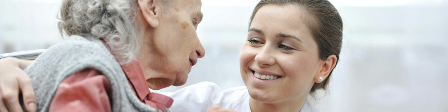 Healthcare worker with a senior patient