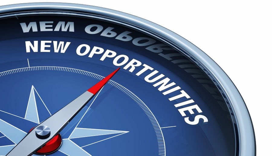 Compass with the words new opportunities.