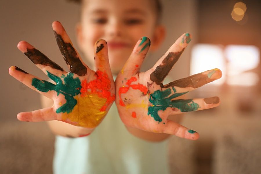 Child with Paint on Hands