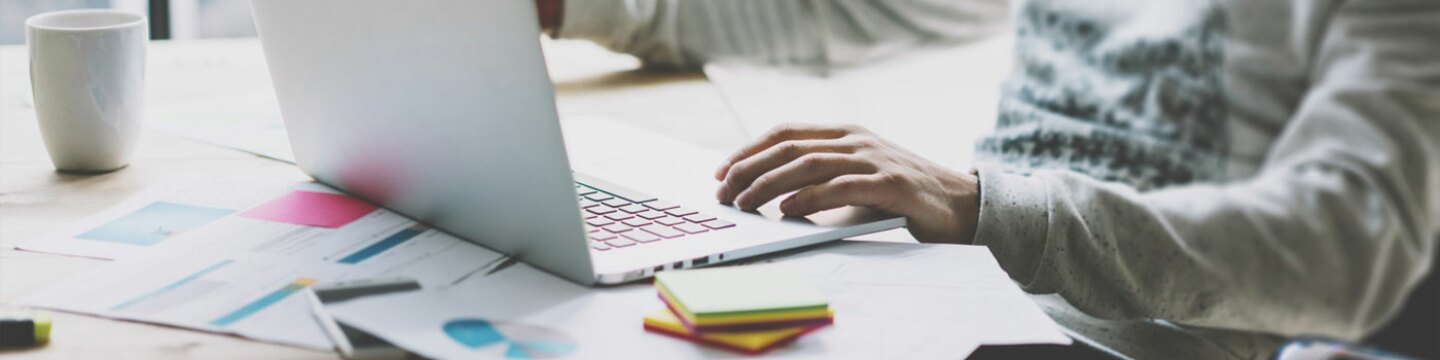 Person working on his laptop from home