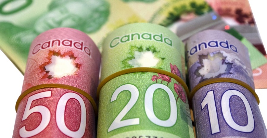 Picture of rolled up Canadian money.