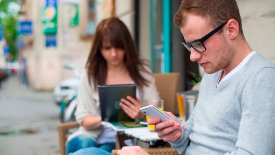 Man & Woman on Mobile Devices