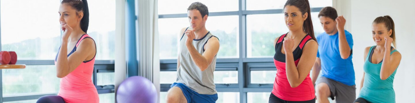 People enjoying a fitness class at a gym