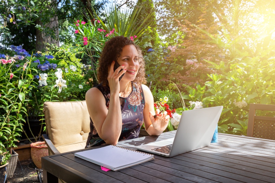 Woman working from home outside