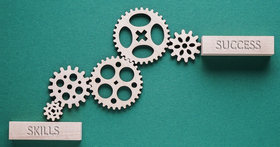 Abstract background with connected gears working together, from skills to success. Creative development process. Business concept.