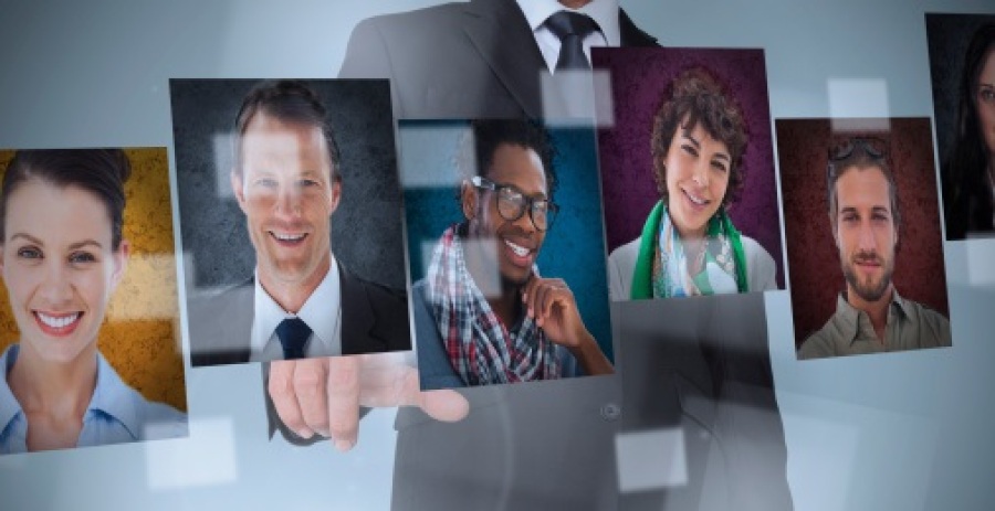 Businessman Searching Thru Profile Pictures