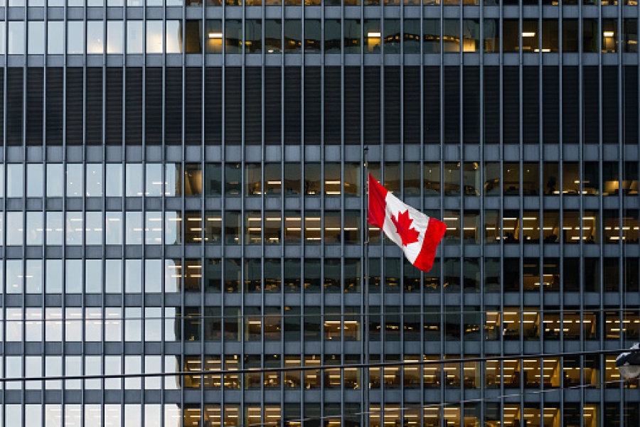 Canadian Flag in Front of Office Building