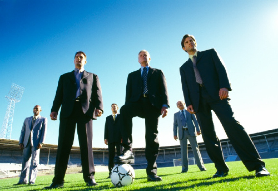 Businessmen Playing Soccer