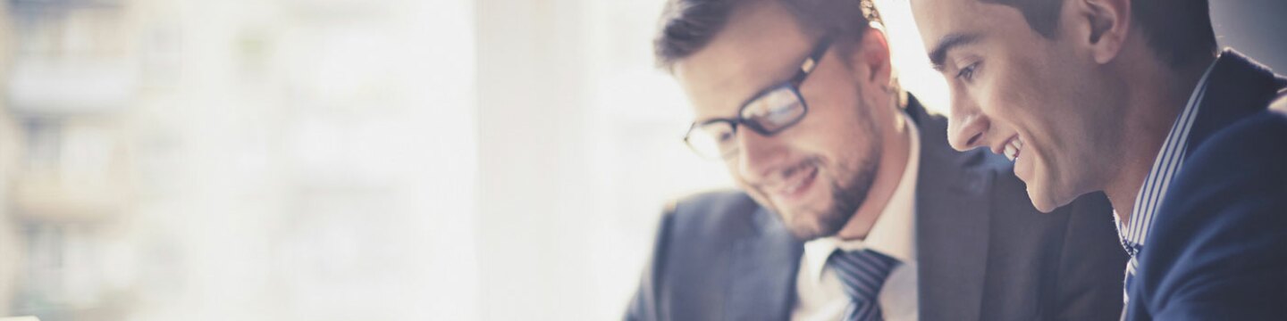 Two people in a business meeting