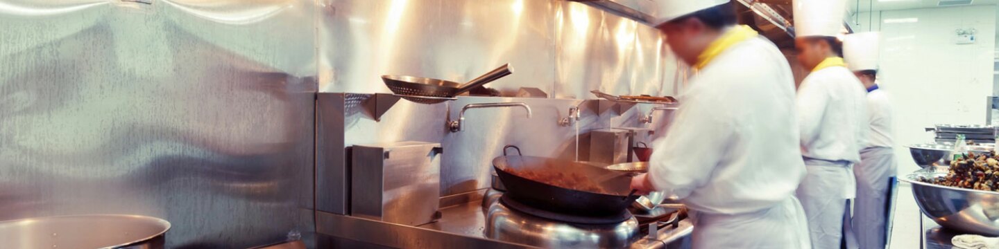 People preparing food at a restaurant