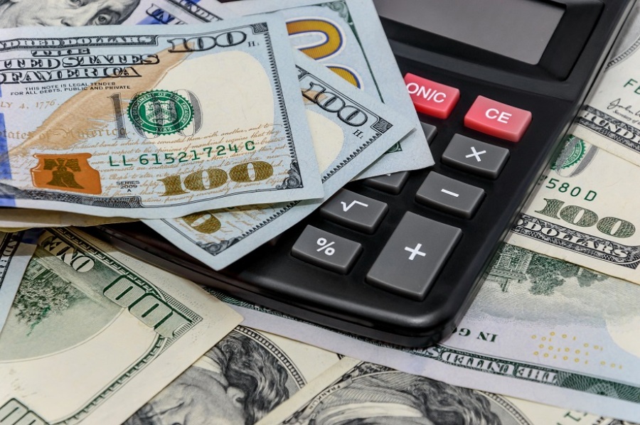 Calculator with $100 Bills