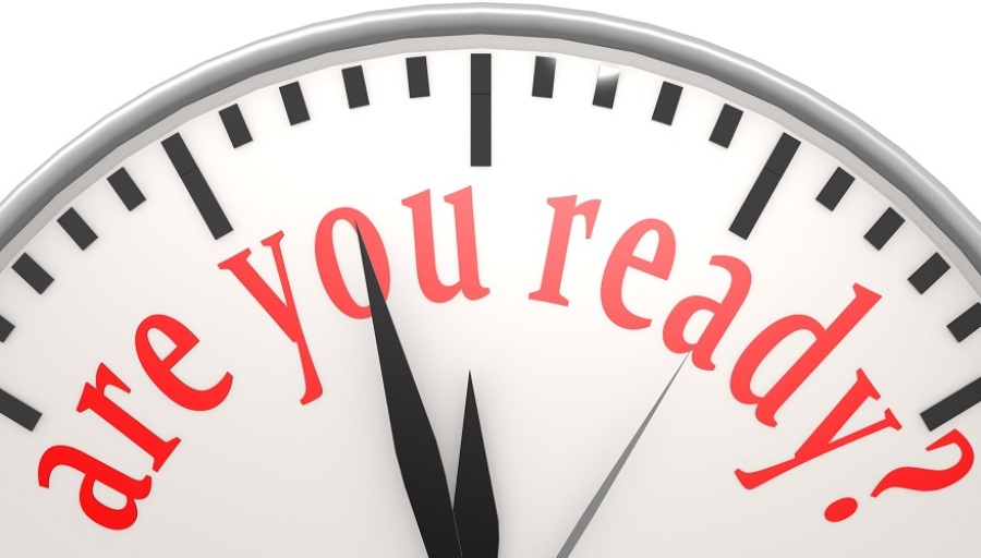 Clock with "are you ready?" saying in red letters.
