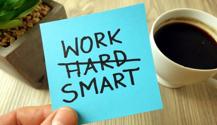 Notepad with work smart on it and the word hard crossed out.